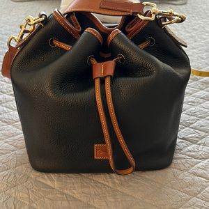 Dooney Bourke bucket bag,black and tan leather